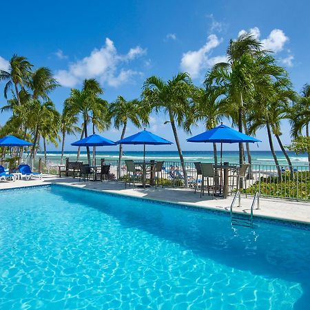 Coconut Court Beach Hotel Christ Church Eksteriør bilde